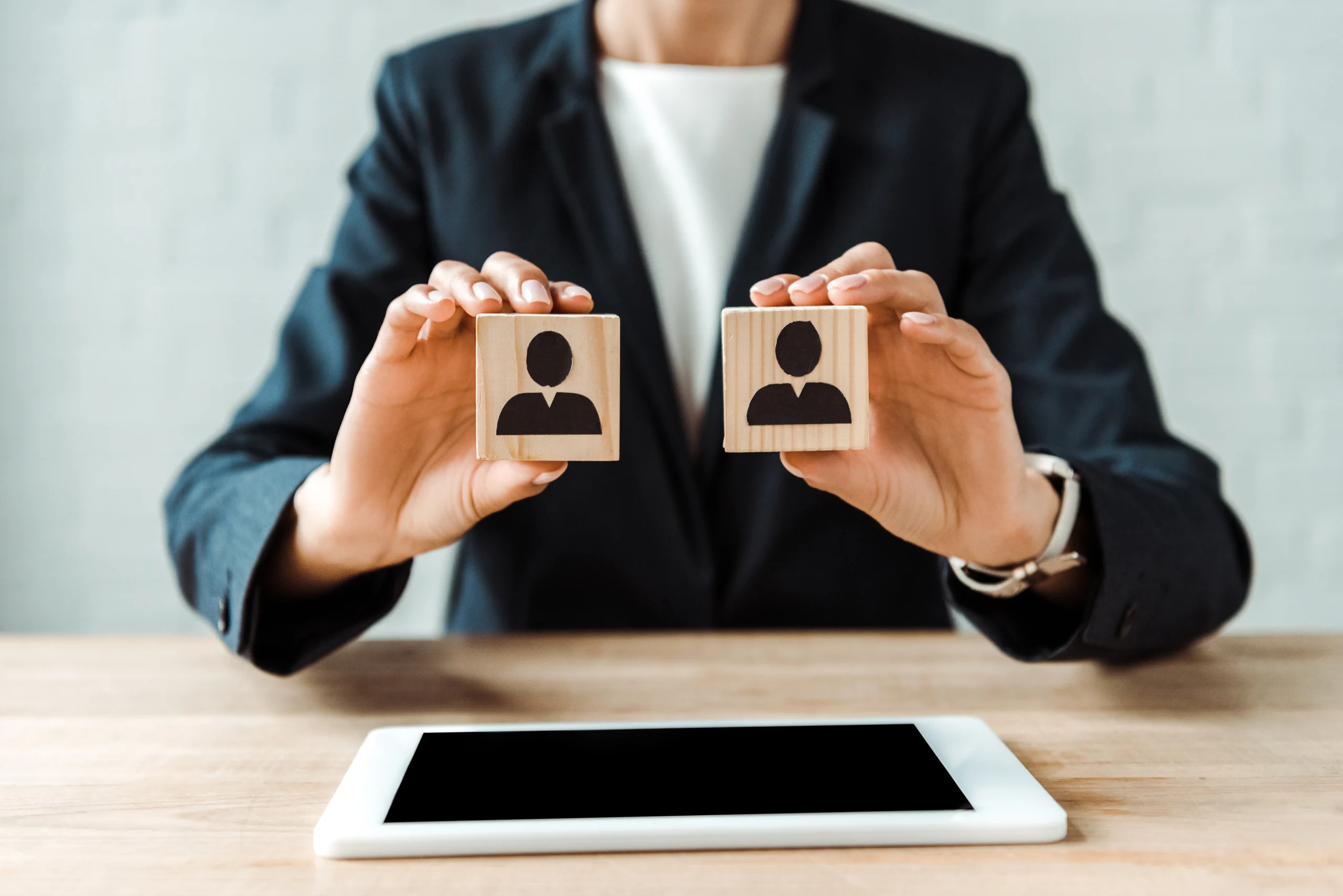 About Incorp Technical Resources, LLC - Cropped view of woman holding wooden cubes