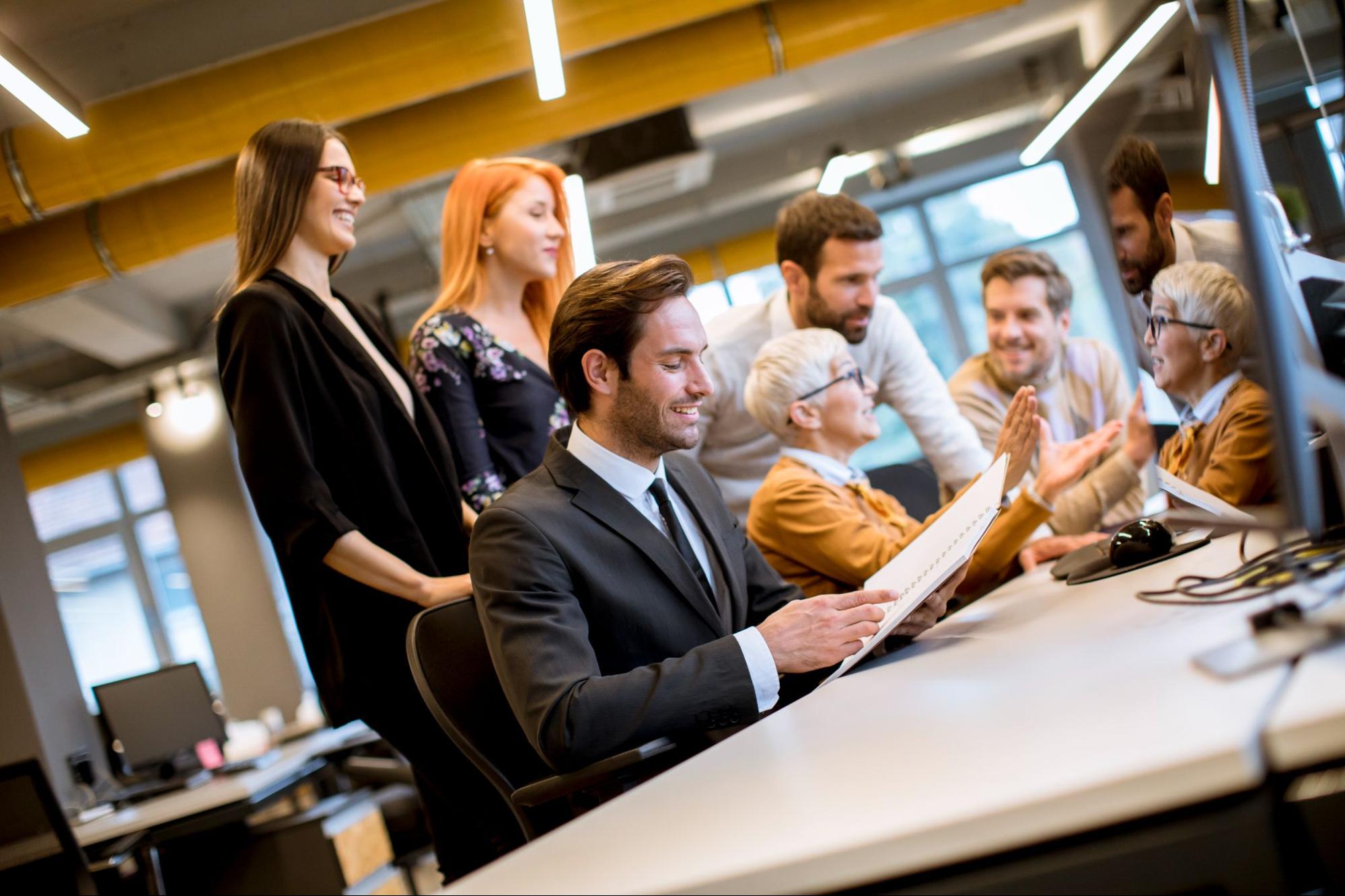 Multi-generational HR team working together on talent strategy